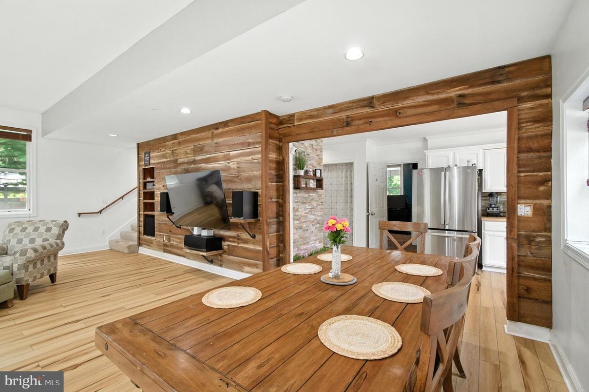 Dining room, Interior, Kitchen, Recessed Lighting, Stainless Steel Appliances, Wood Texture Flooring, Wooden Walls