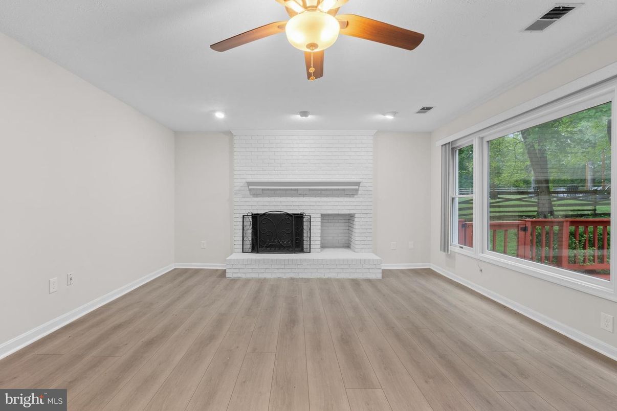 Empty room, Fireplace, Interior, Recessed Lighting, Wood Texture Flooring