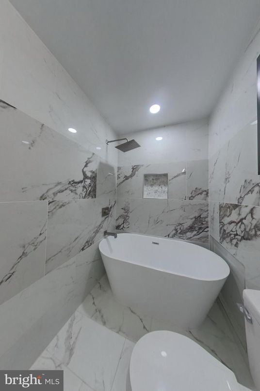Bathroom, Free Standing Baths, Interior, Marble, Marble Walls, Recessed Lighting