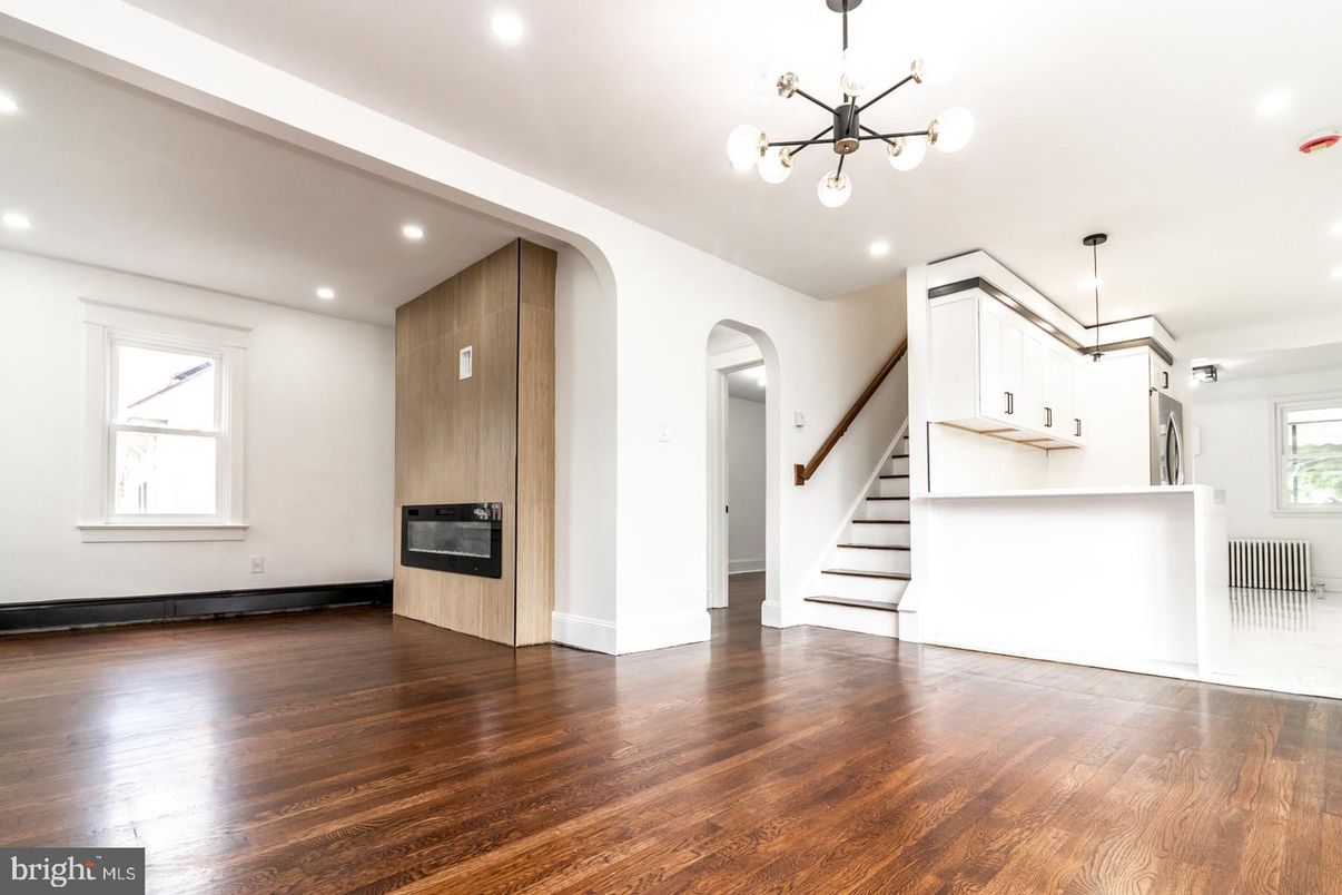 Empty room, Fireplace, Interior, Pendant Lights, Recessed Lighting, Wood Texture Flooring