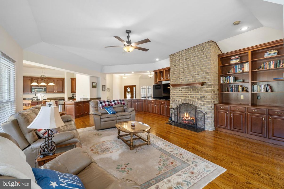 Fireplace, Interior, Kitchen, Living room, Pendant Lights, Recessed Lighting, Stone Walls, Wood Texture Flooring