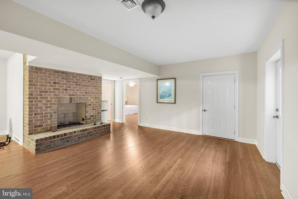 Empty room, Fireplace, Interior, Stone Walls, Wood Texture Flooring