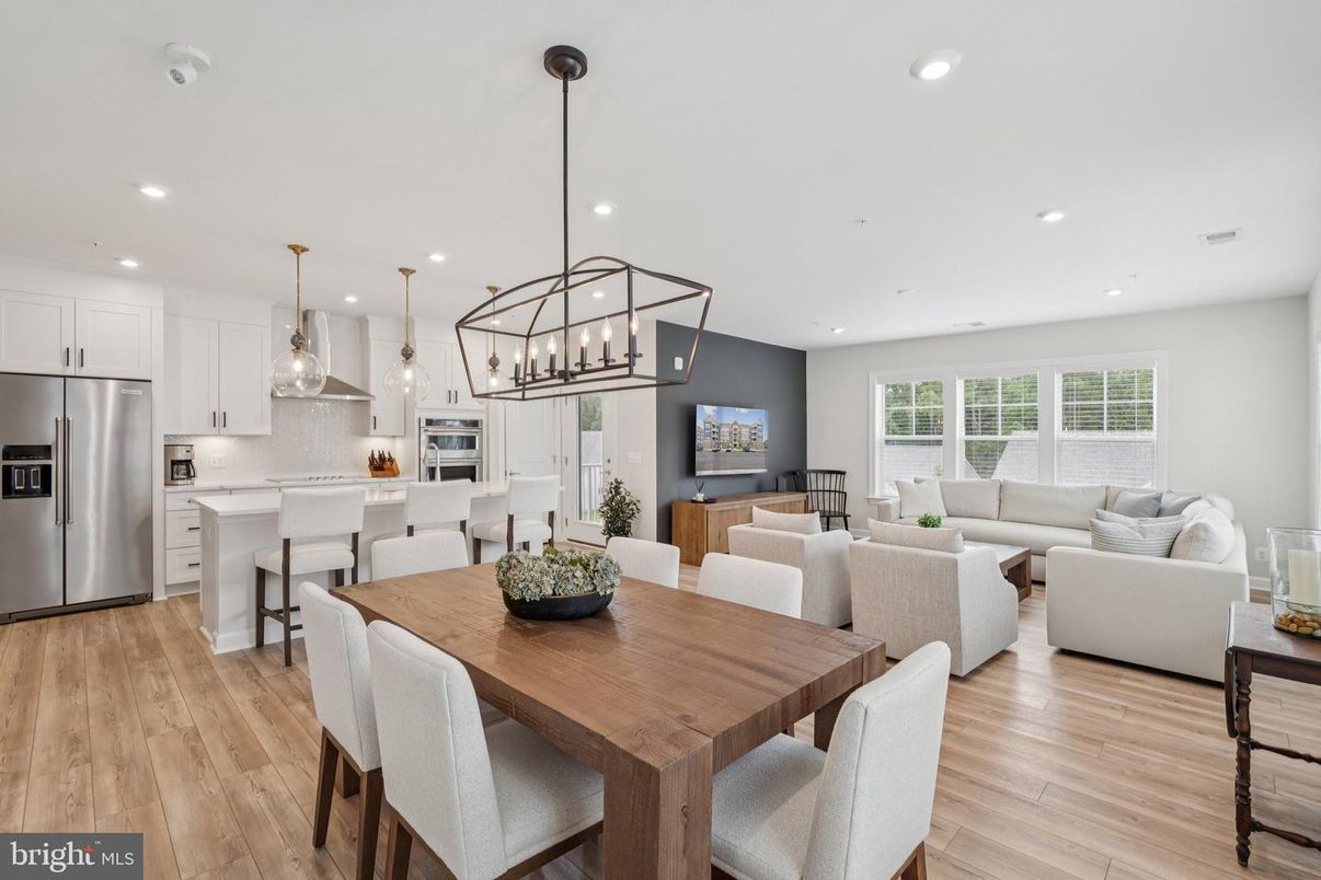 Dining room, Interior, Kitchen, Living room, Pendant Lights, Recessed Lighting, Stainless Steel Appliances, Wood Texture Flooring