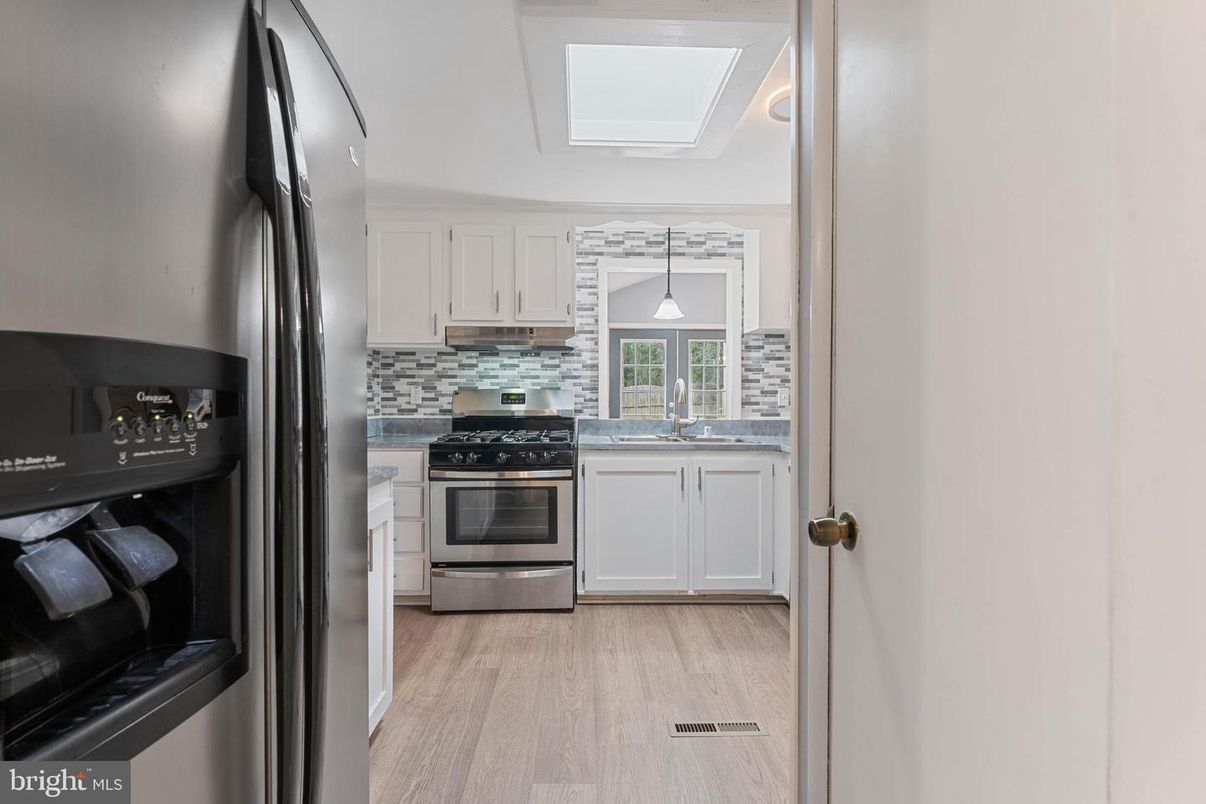 Interior, Kitchen, Pendant Lights, Stainless Steel Appliances, Wood Texture Flooring