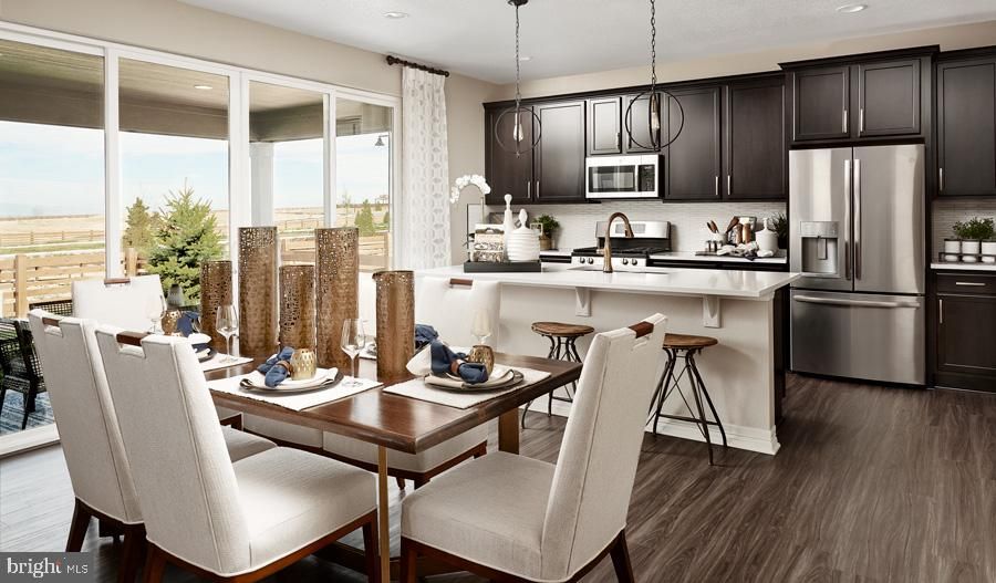 Dining room, Interior, Kitchen, Pendant Lights, Recessed Lighting, Stainless Steel Appliances, Wood Texture Flooring