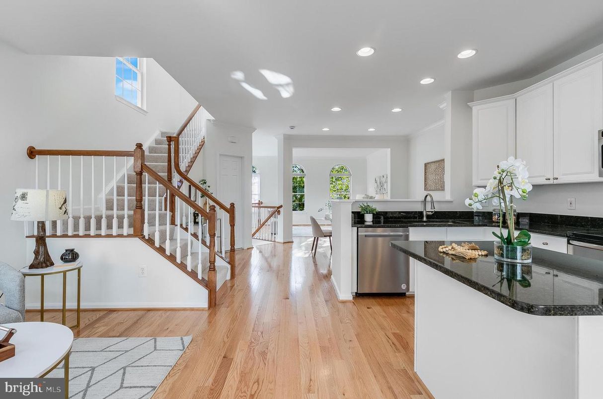 Dining room, Interior, Kitchen, Recessed Lighting, Stainless Steel Appliances, Wood Texture Flooring