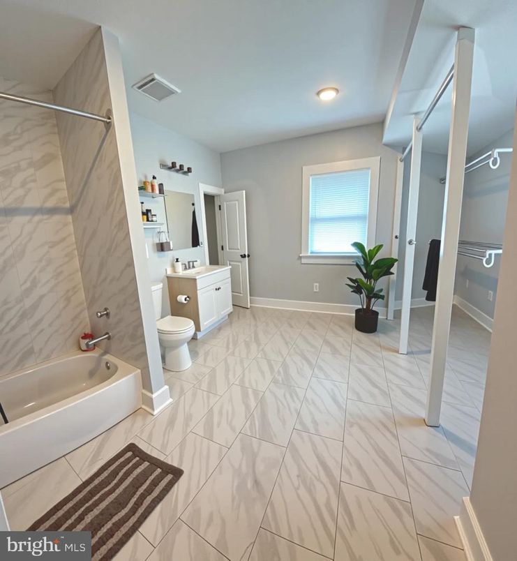 Bathroom, Dual Sink Vanities, Interior, Marble, Marble Walls, Recessed Lighting