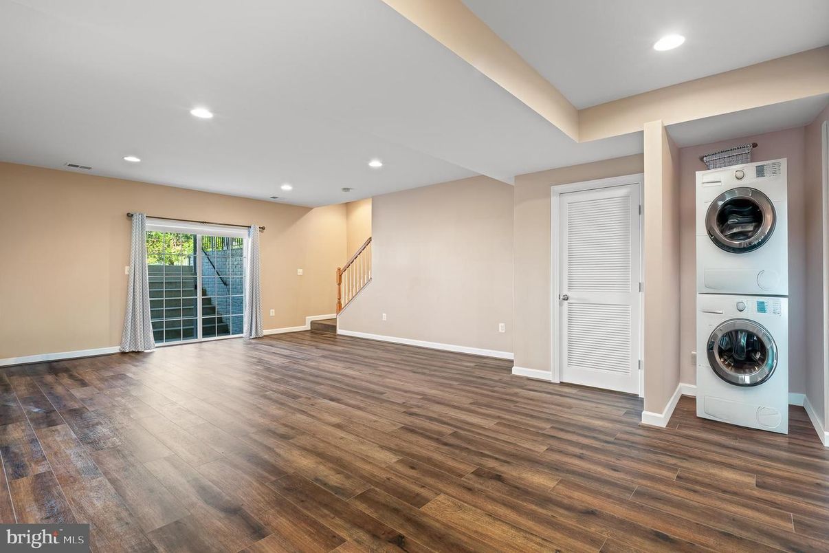 Empty room, Interior, Recessed Lighting, Utility Closets, Washer, Wood Texture Flooring