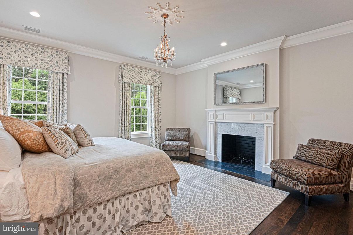 Bedroom, Chandelier, Fireplace, Interior, Recessed Lighting, Wood Texture Flooring