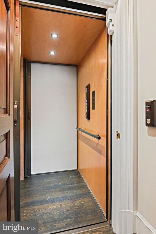 Elevator, Interior, Recessed Lighting, Wood Texture Flooring, Wooden Walls