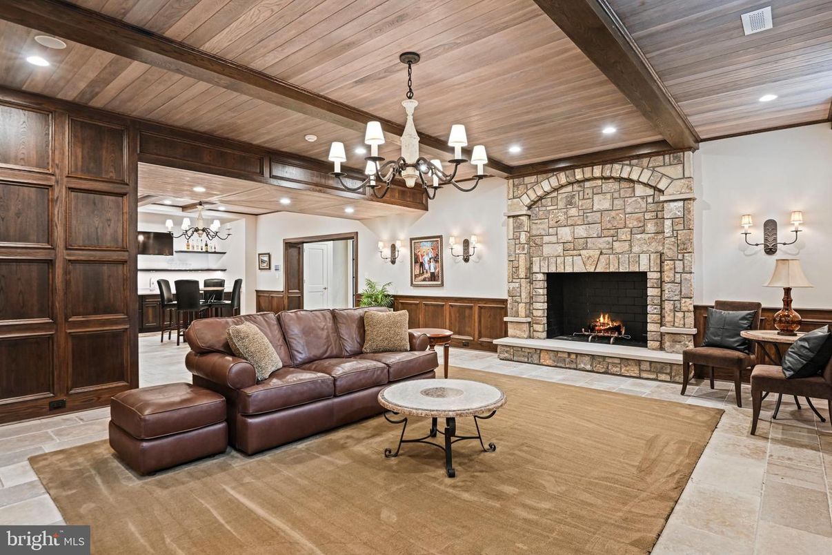 Chandelier, Dining room, Fireplace, Interior, Living room, Recessed Lighting, Stone Walls, Wooden Beams, Wooden Ceilings