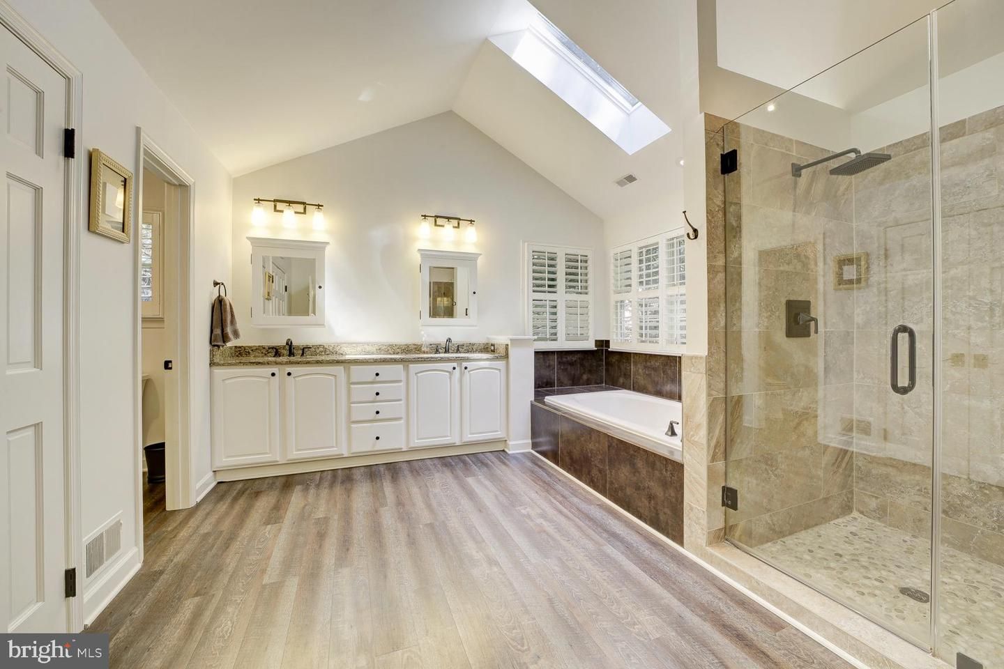Bathroom, Dual Sink Vanities, Glass Shower, Interior, Wood Texture Flooring