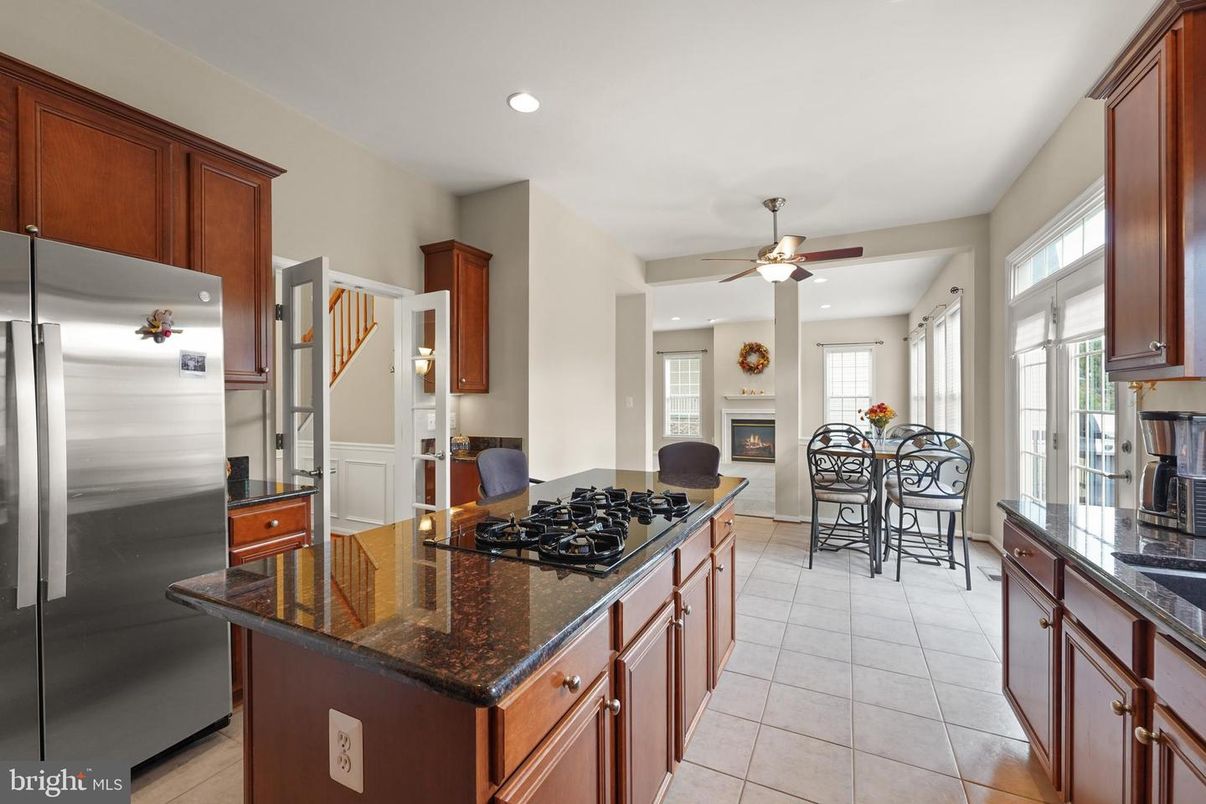 Dining room, Fireplace, Interior, Kitchen, Recessed Lighting, Stainless Steel Appliances