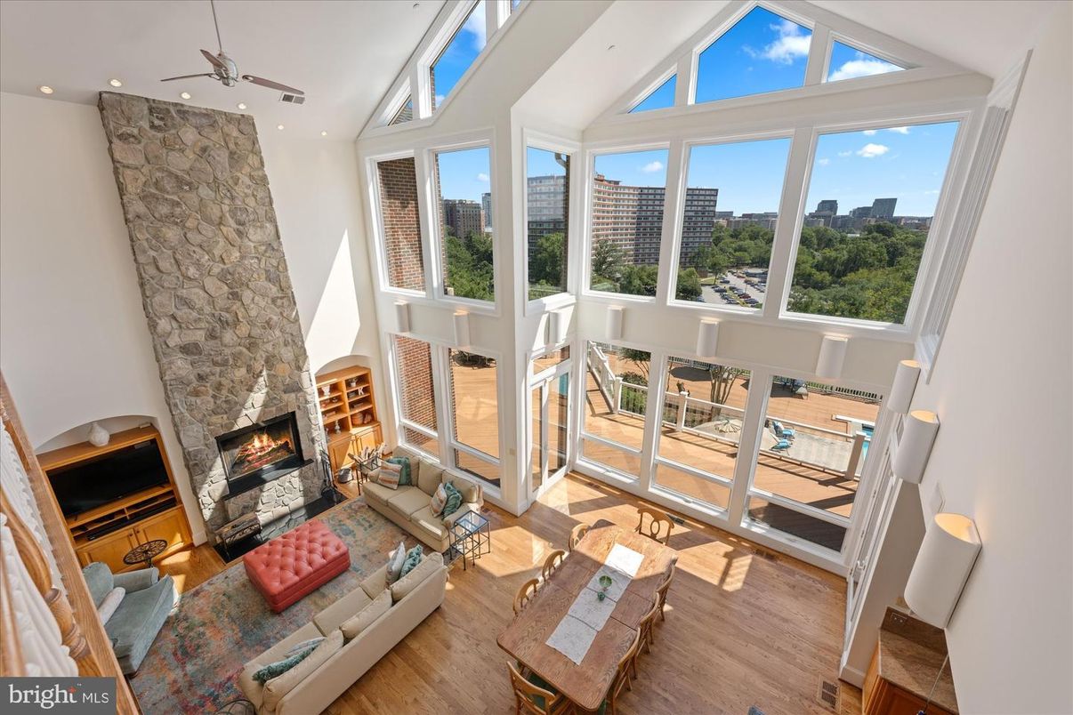 Fireplace, Interior, Living room, Recessed Lighting, Stone Walls, Wood Texture Flooring