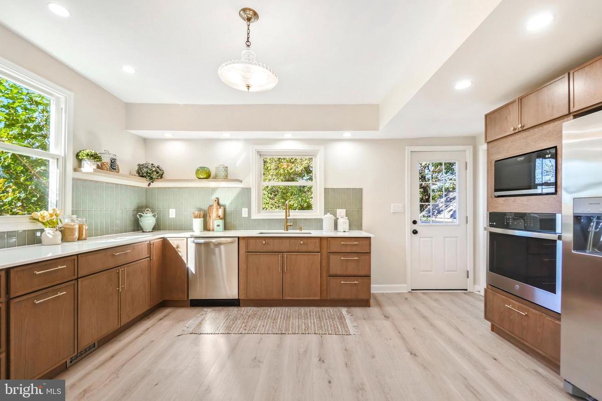 Interior, Kitchen, Pendant Lights, Recessed Lighting, Stainless Steel Appliances, Wood Texture Flooring