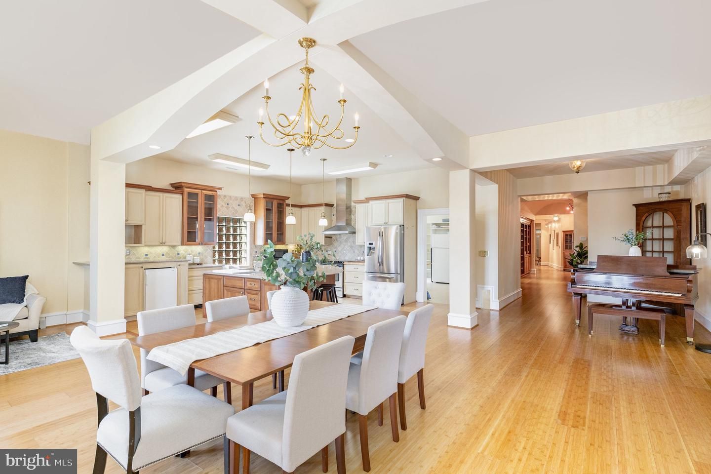 Chandelier, Dining room, Interior, Kitchen, Piano, Recessed Lighting, Stainless Steel Appliances, Wood Texture Flooring