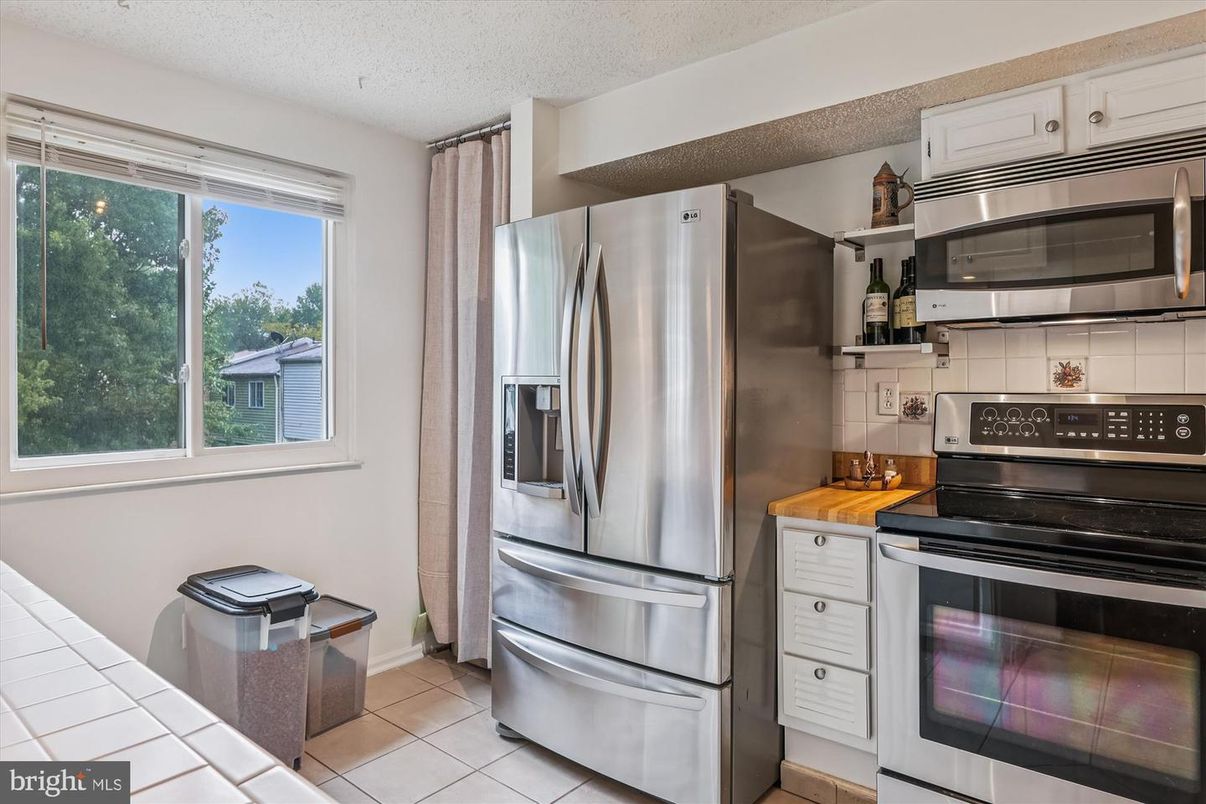 Interior, Kitchen, Stainless Steel Appliances, Tile Countertops