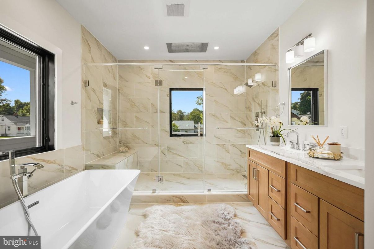 Bathroom, Dual Sink Vanities, Free Standing Baths, Glass Shower, Interior, Marble, Marble Walls, Recessed Lighting
