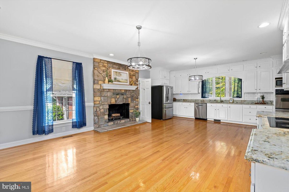 Fireplace, Interior, Kitchen, Pendant Lights, Recessed Lighting, Stainless Steel Appliances, Wood Texture Flooring