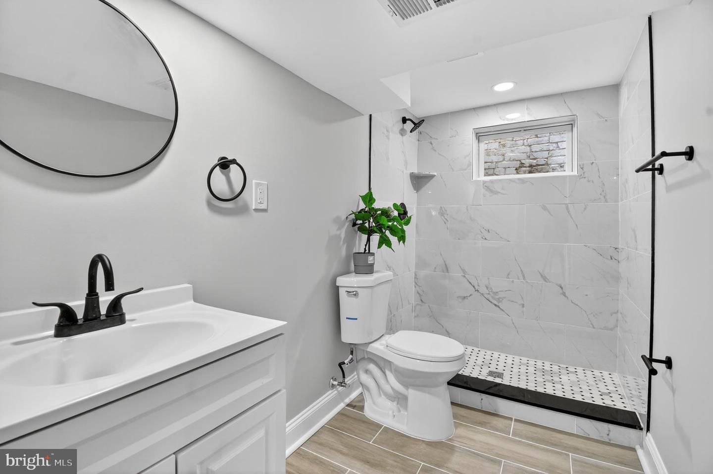 Bathroom, Glass Shower, Interior, Marble Walls, Recessed Lighting, Wood Texture Flooring