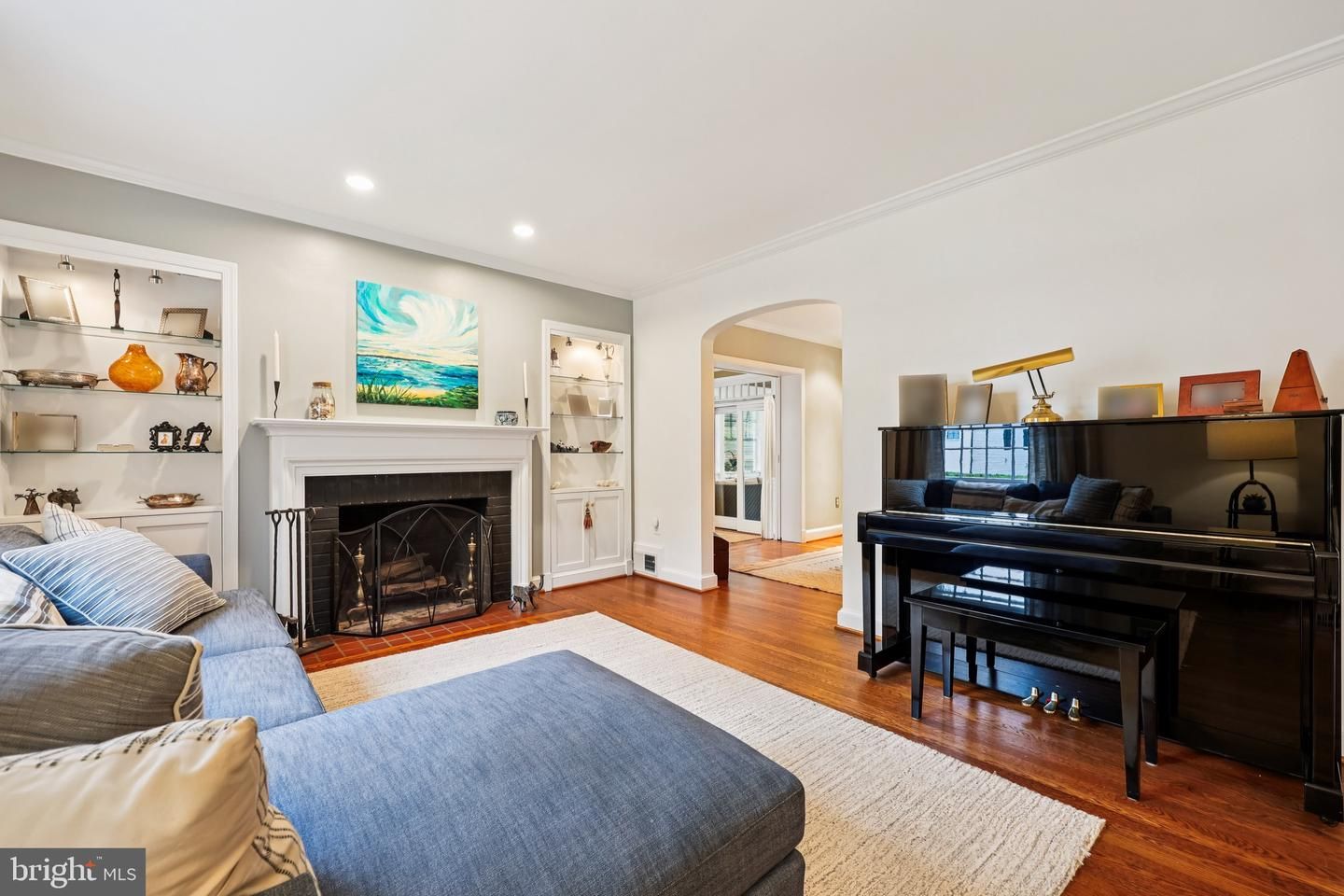 Fireplace, Interior, Living room, Piano, Recessed Lighting, Wood Texture Flooring