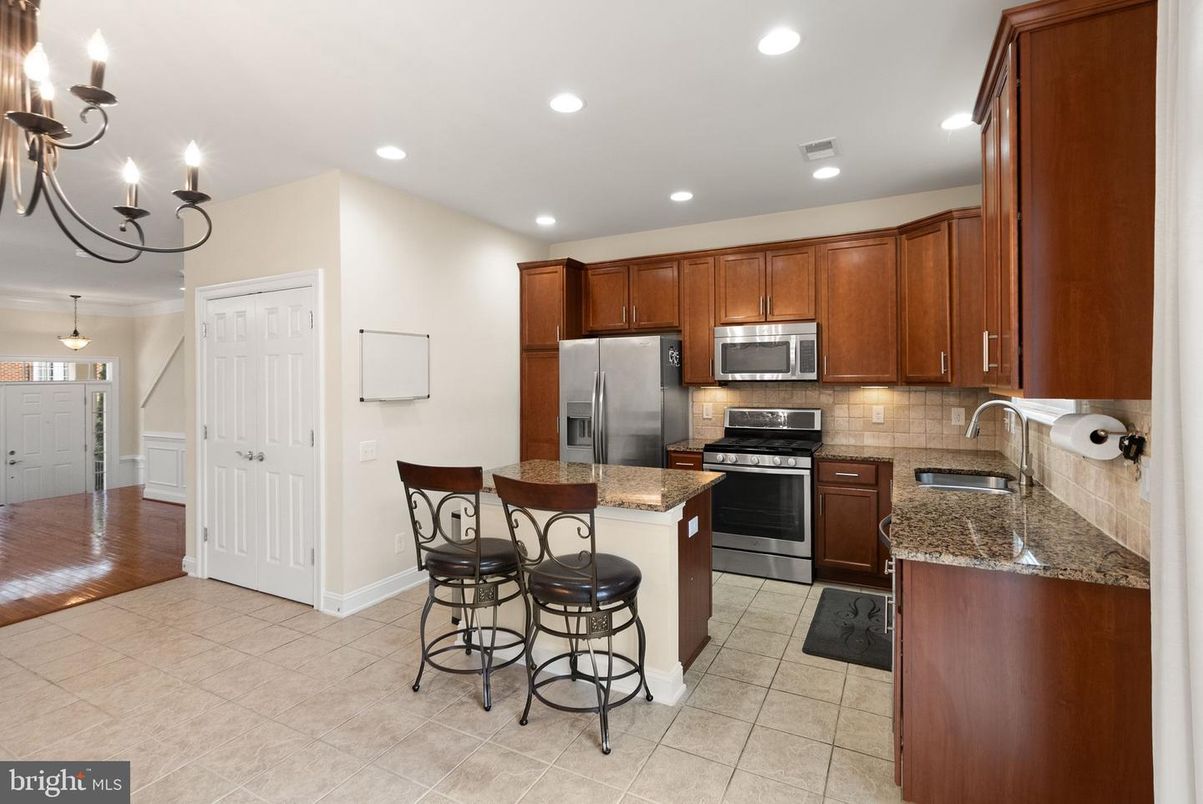 Chandelier, Interior, Kitchen, Pendant Lights, Recessed Lighting, Stainless Steel Appliances, Wood Texture Flooring