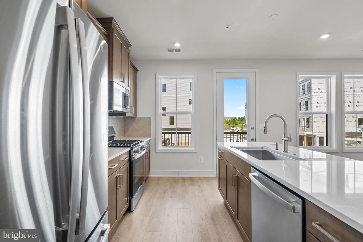 Interior, Kitchen, Recessed Lighting, Stainless Steel Appliances, Wood Texture Flooring