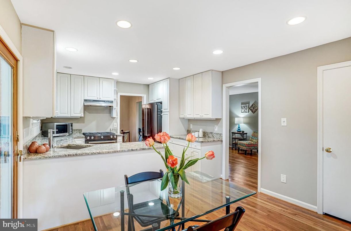 Dining room, Interior, Kitchen, Recessed Lighting, Stainless Steel Appliances, Wood Texture Flooring