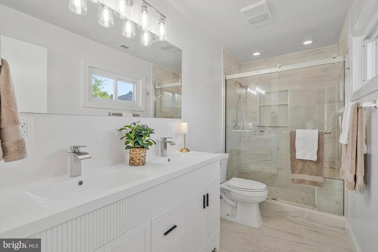 Bathroom, Dual Sink Vanities, Glass Shower, Interior, Marble Walls, Recessed Lighting