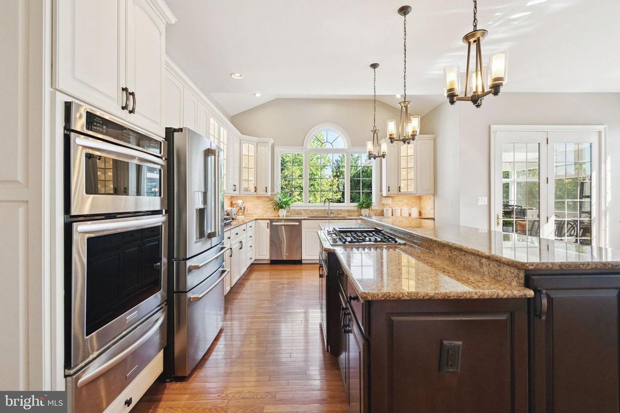 Chandelier, Interior, Kitchen, Pendant Lights, Recessed Lighting, Stainless Steel Appliances, Wood Texture Flooring
