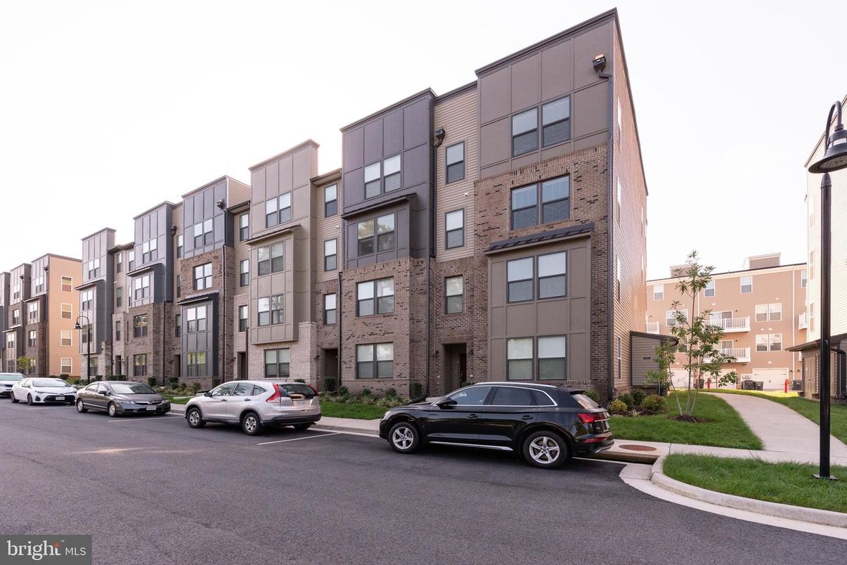 Exterior, Facade, Brick Facade, Condo Building