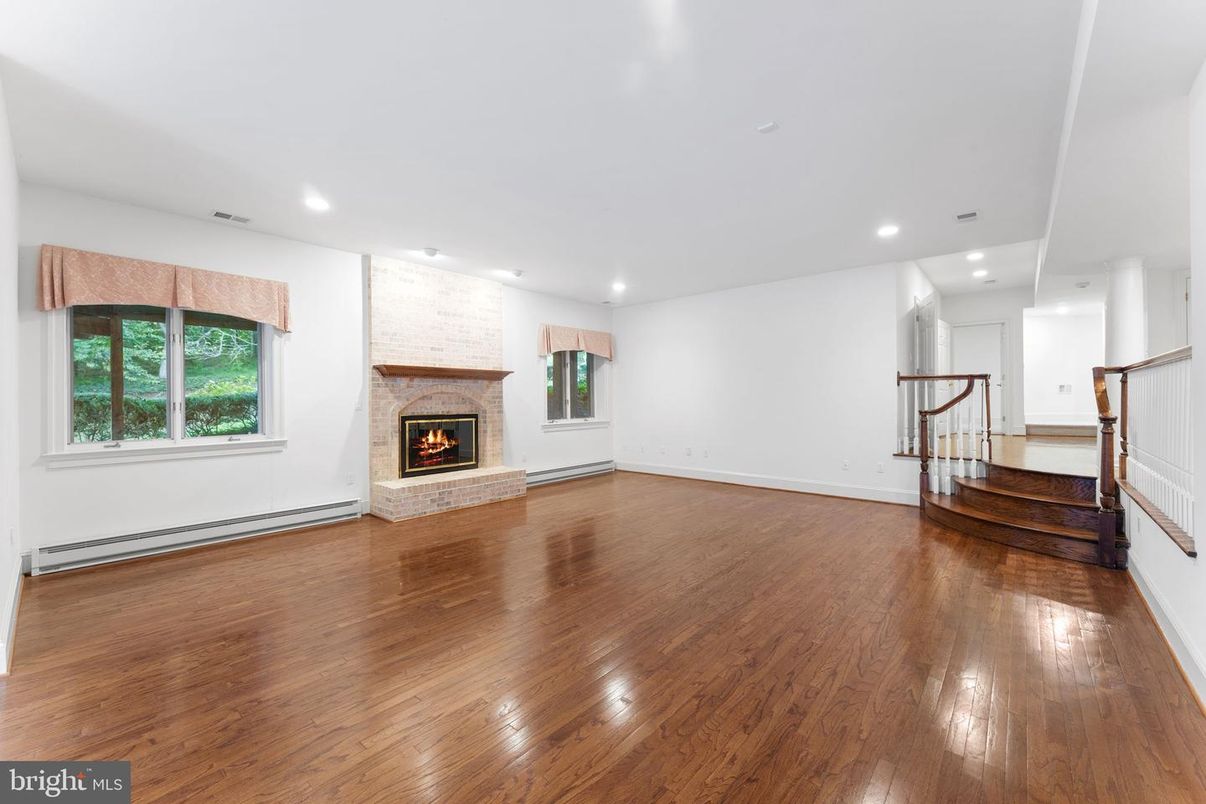 Empty room, Fireplace, Interior, Recessed Lighting, Wood Texture Flooring