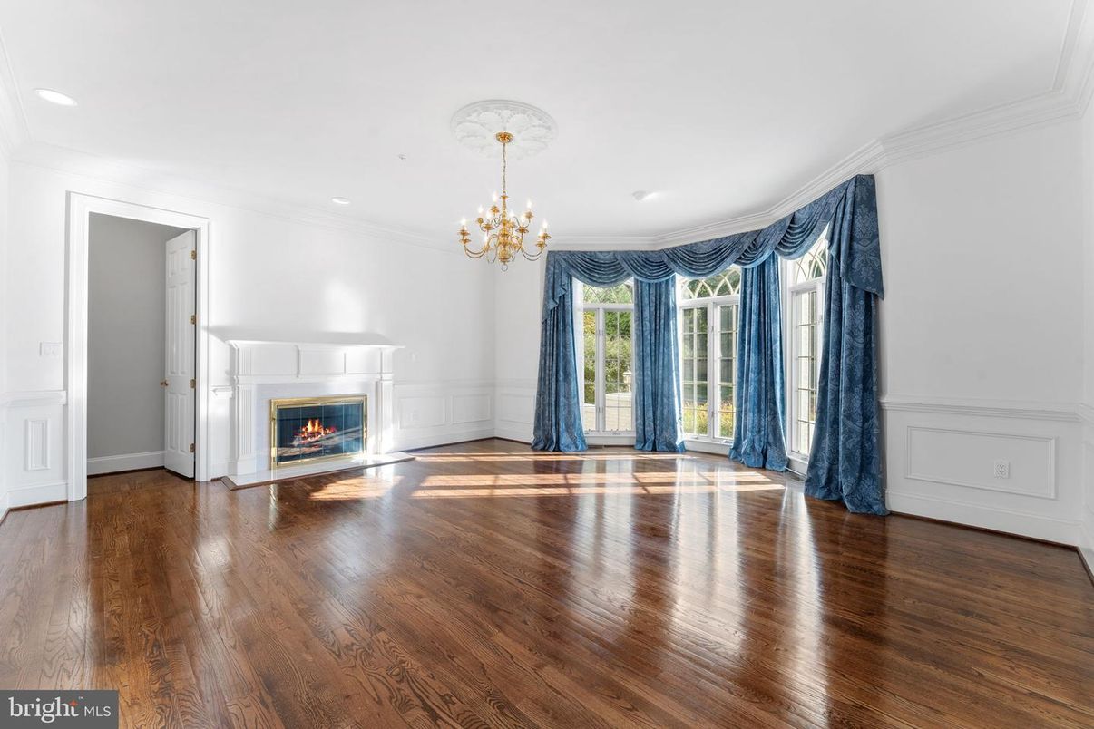 Chandelier, Empty room, Fireplace, Interior, Recessed Lighting, Wood Texture Flooring