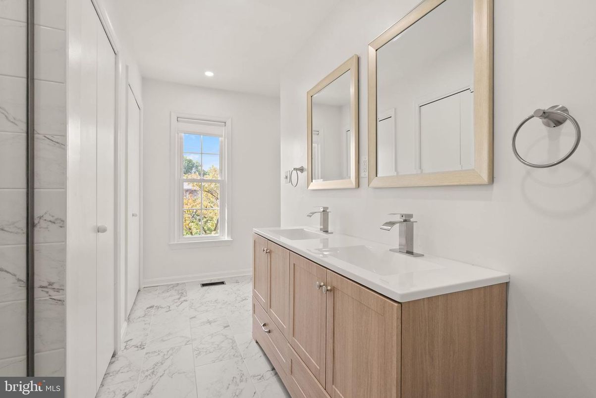 Bathroom, Dual Sink Vanities, Interior, Marble, Marble Walls, Recessed Lighting