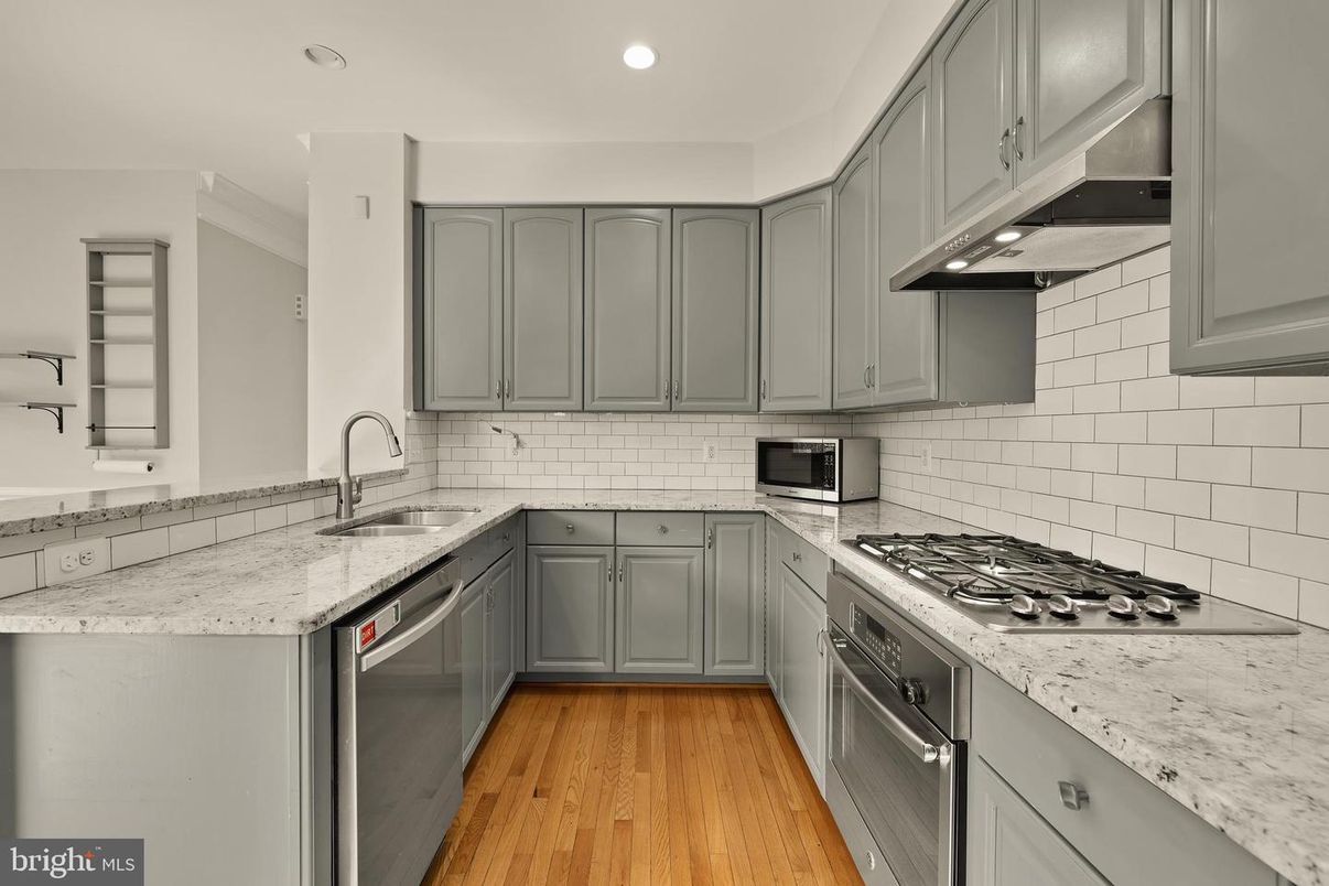 Interior, Kitchen, Recessed Lighting, Stainless Steel Appliances, Wood Texture Flooring