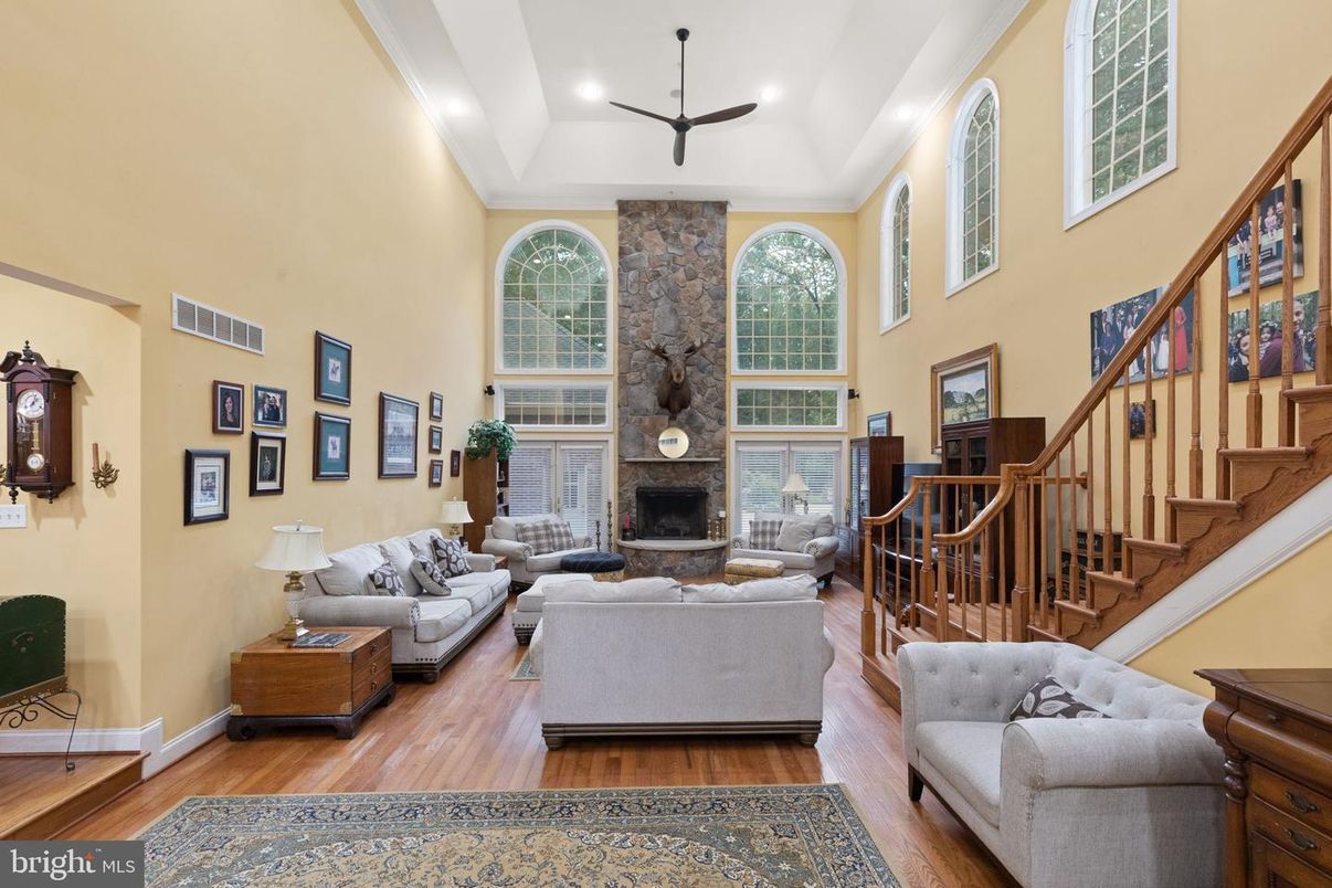 Fireplace, Interior, Living room, Recessed Lighting, Stone Walls, Wood Texture Flooring