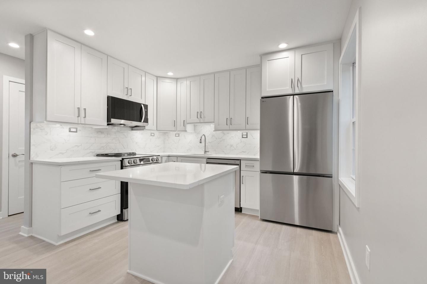 Interior, Kitchen, Marble Walls, Recessed Lighting, Wood Texture Flooring