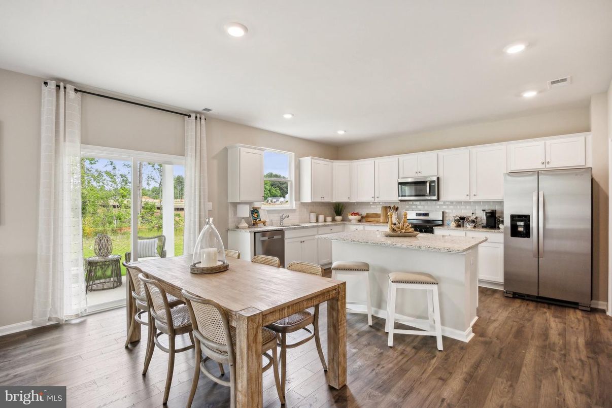 Dining room, Interior, Kitchen, Recessed Lighting, Stainless Steel Appliances, Wood Texture Flooring