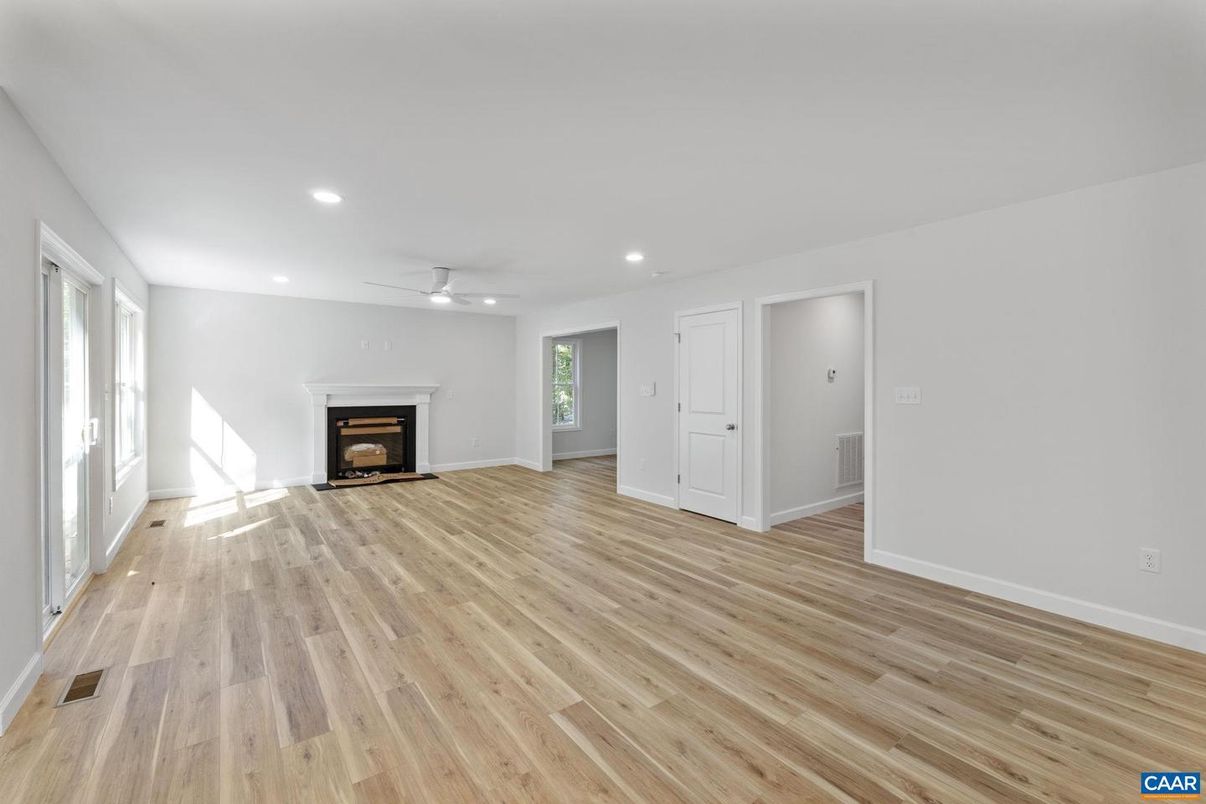 Empty room, Fireplace, Interior, Recessed Lighting, Wood Texture Flooring