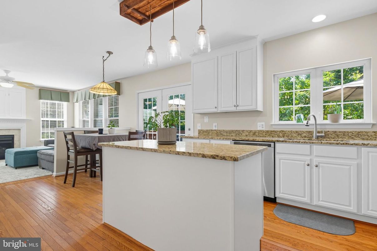 Dining room, Fireplace, Interior, Kitchen, Pendant Lights, Recessed Lighting, Wood Texture Flooring