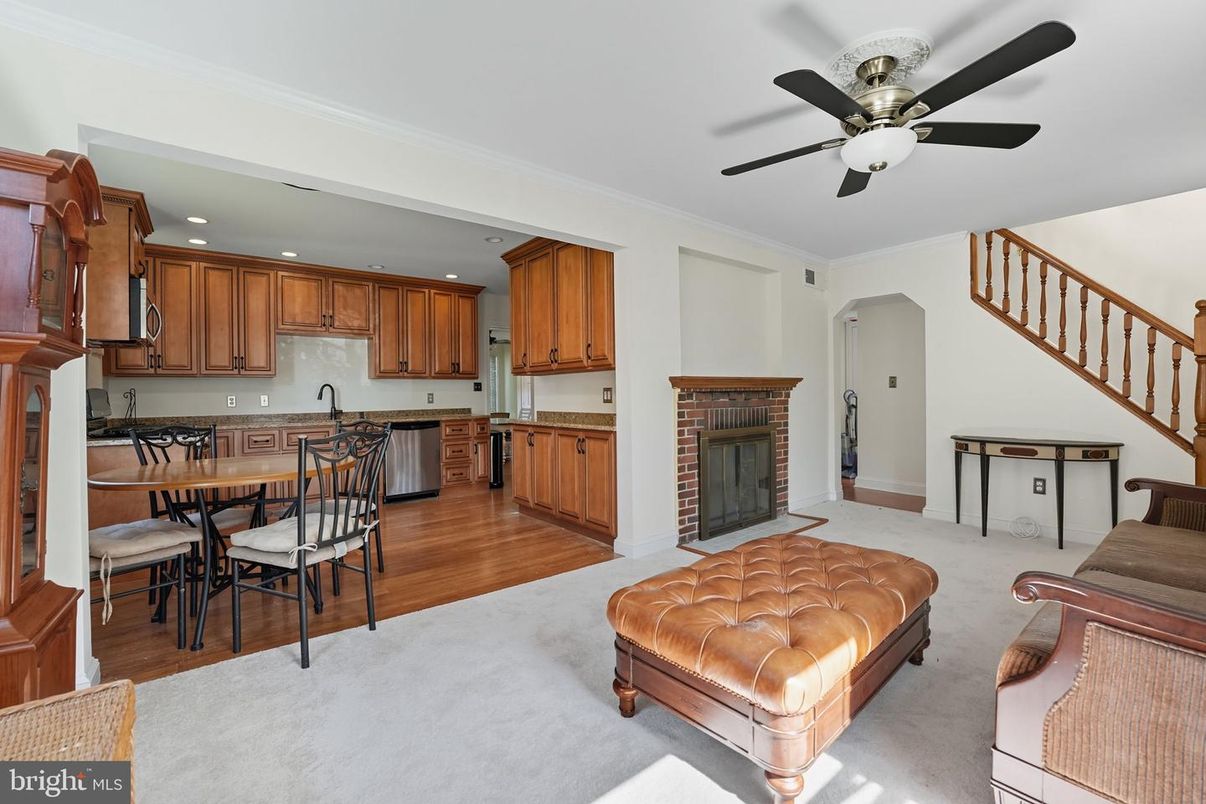 Dining room, Fireplace, Interior, Kitchen, Recessed Lighting, Wood Texture Flooring