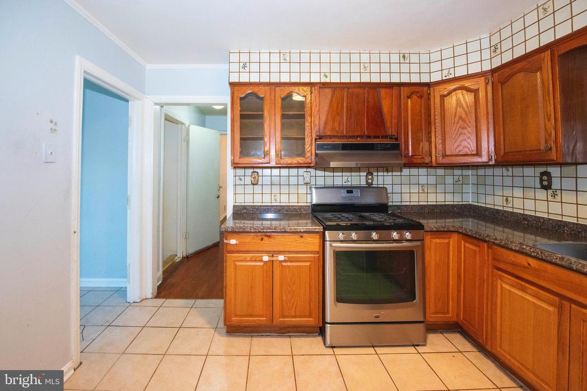 Interior, Kitchen, Tile Countertops, Wood Texture Flooring