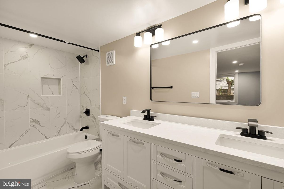 Bathroom, Dual Sink Vanities, Interior, Marble, Marble Walls, Recessed Lighting