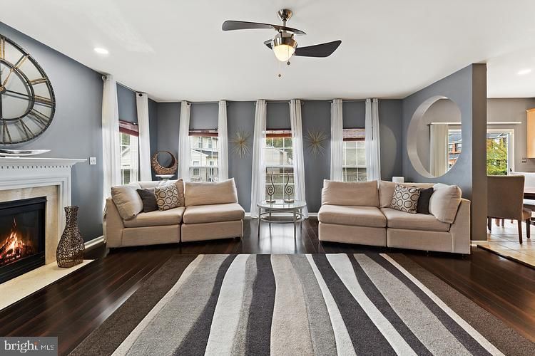 Dining room, Fireplace, Interior, Living room, Recessed Lighting, Wood Texture Flooring