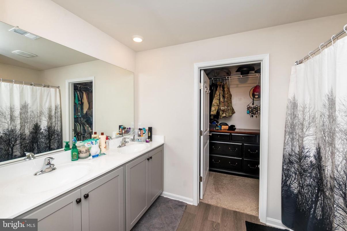 Bathroom, Dual Sink Vanities, Interior, Recessed Lighting, Wood Texture Flooring