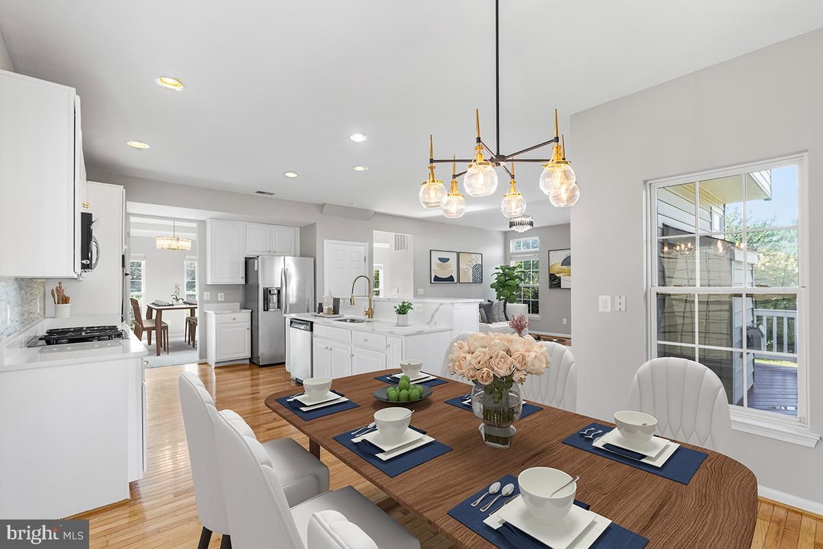 Dining room, Interior, Kitchen, Pendant Lights, Recessed Lighting, Stainless Steel Appliances, Wood Texture Flooring