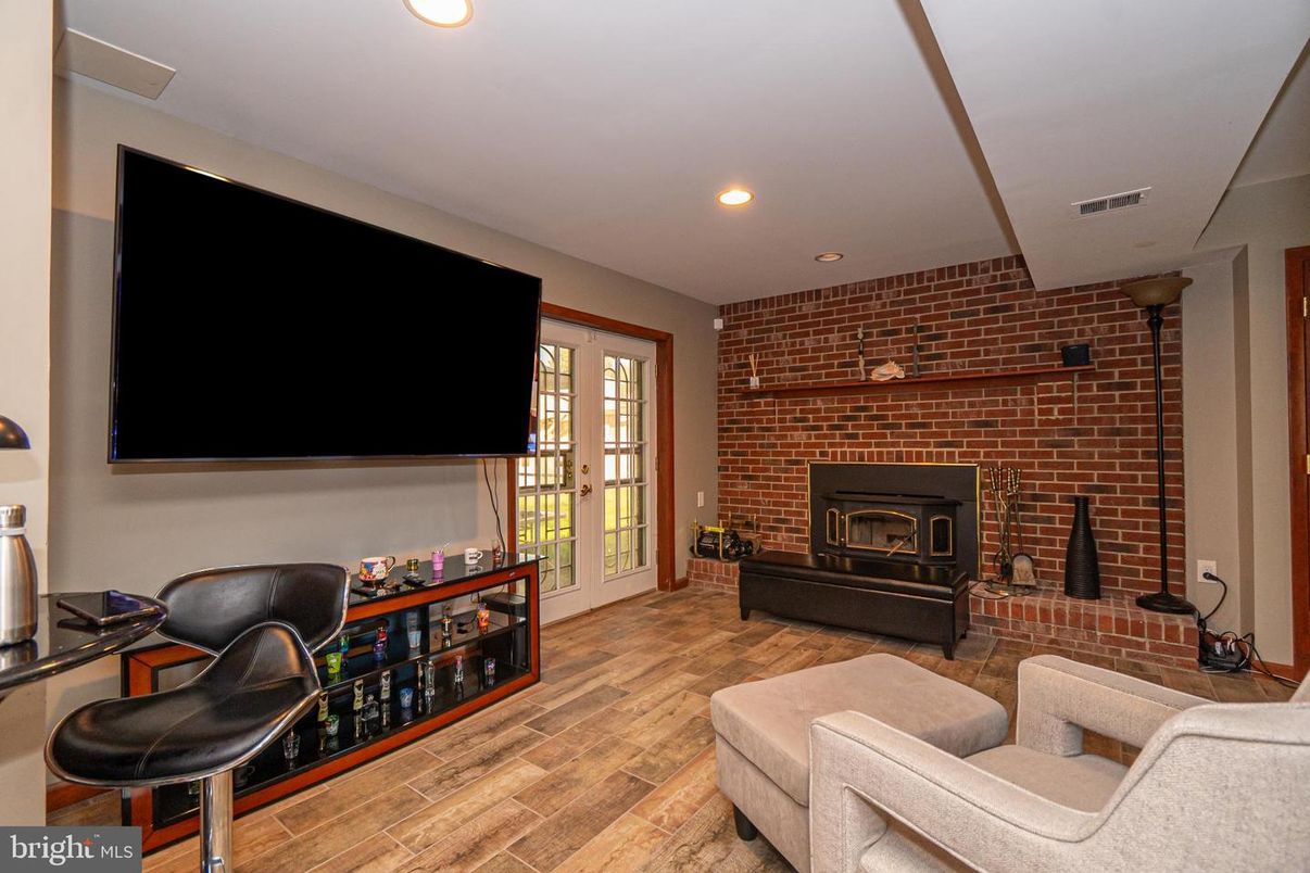 Fireplace, Interior, Recessed Lighting, Stone Walls, Wood Texture Flooring