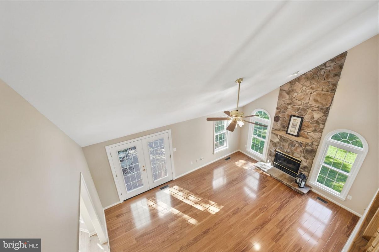 Empty room, Fireplace, Interior, Stone Walls, Wood Texture Flooring