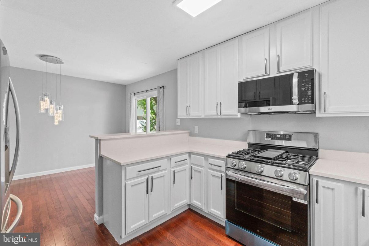 Interior, Kitchen, Pendant Lights, Stainless Steel Appliances, Wood Texture Flooring