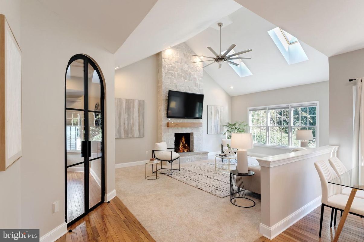 Fireplace, Interior, Living room, Recessed Lighting, Stone Walls, Wood Texture Flooring